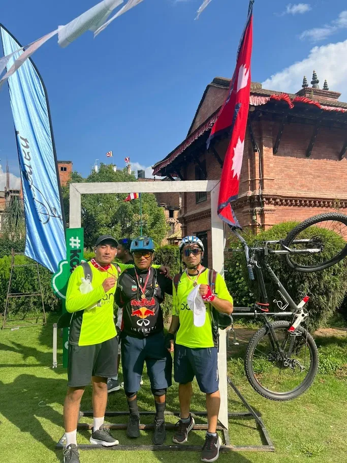 Riders climbing the green hills of Kathmandu valley during Kora 2025.